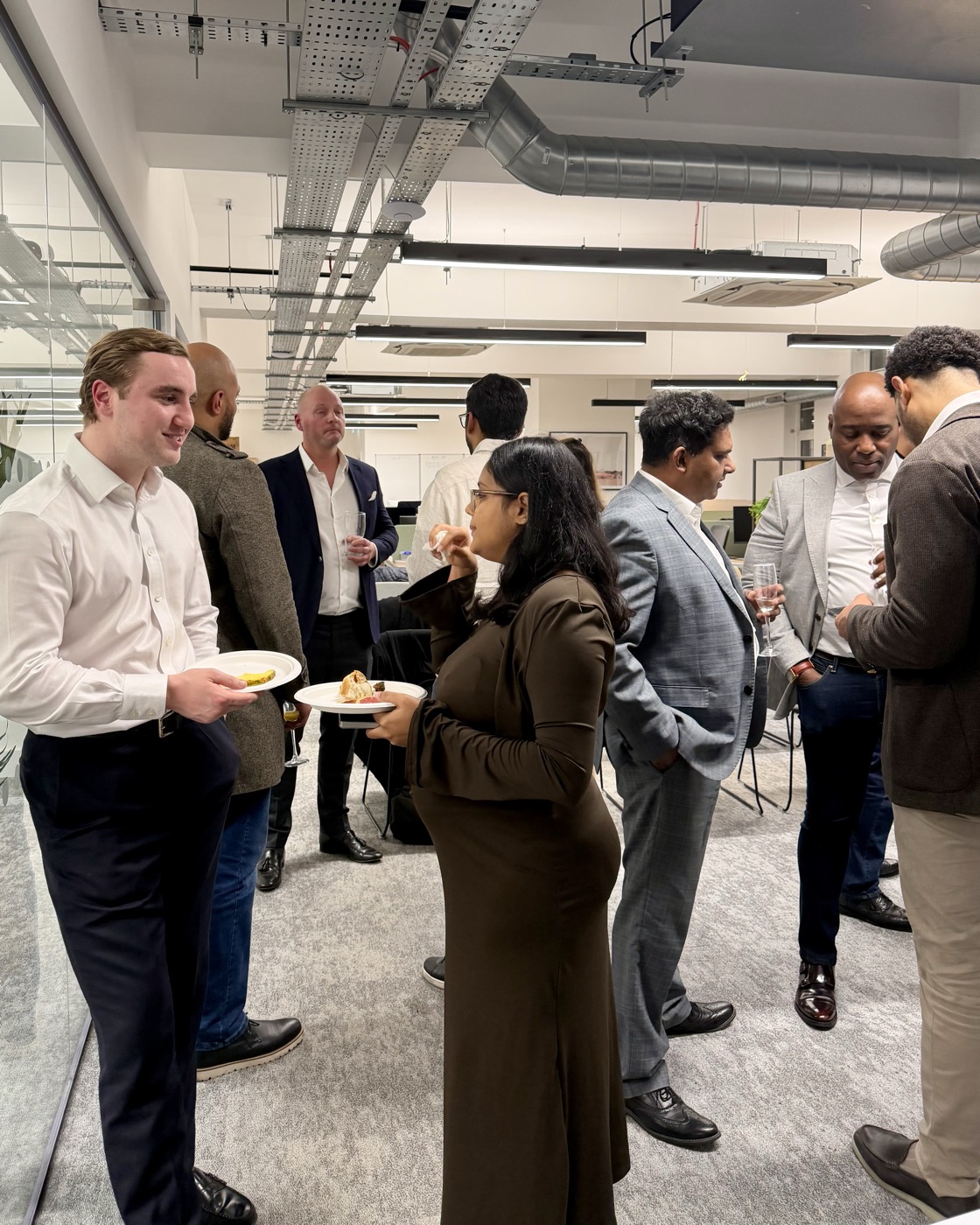 Investors and the Langford Pierce team networking at a community event